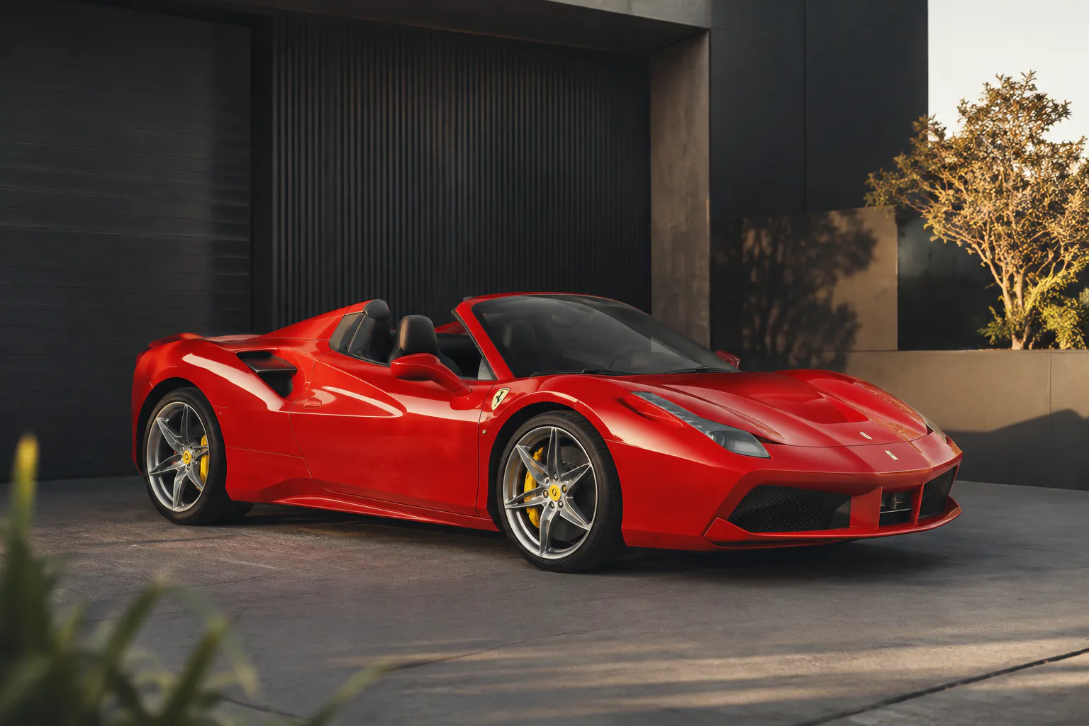 Red Ferrari 488 Spider representing prestige vehicle finance